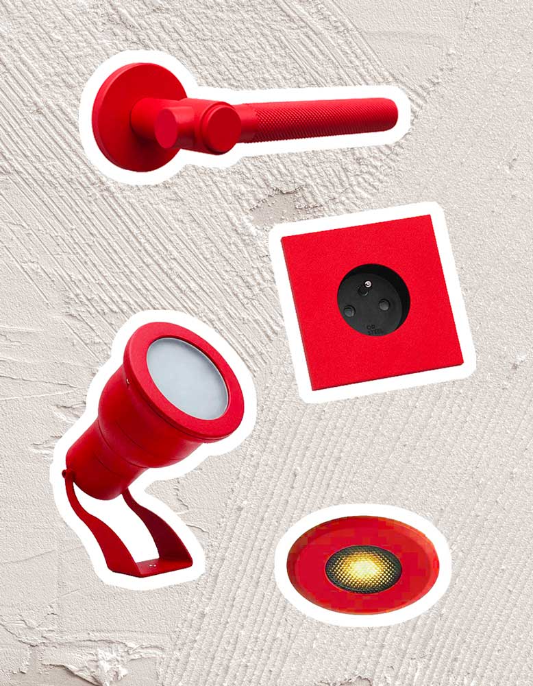 Madame steel, harmonie des finitions entre appareillage, quincaillerie et éclairage en rouge texturé